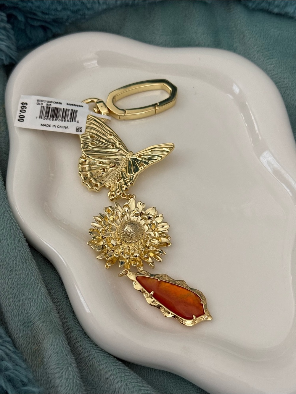 Kendra Scott Butterfly & Floral Gold Bag Charm with Orange Amber